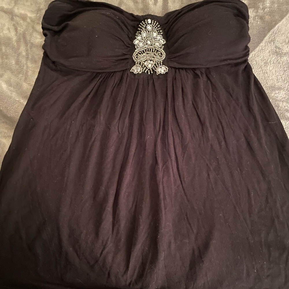 Strapless Black shirt with silver accent on chest.  Size L.
